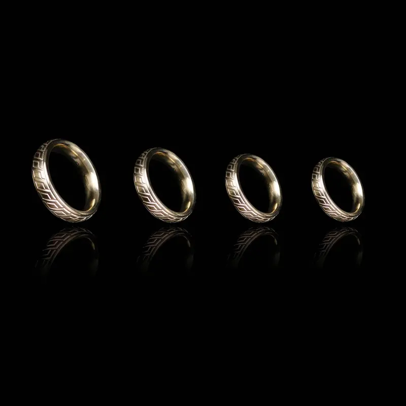 DARKLINE Golden Wave Cockring, Bronze-Stahl, Donut graviert | Dark-Ink
