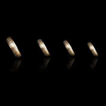 DARKLINE Golden Wave Cockring, Bronze-Stahl, Donut graviert | Dark-Ink