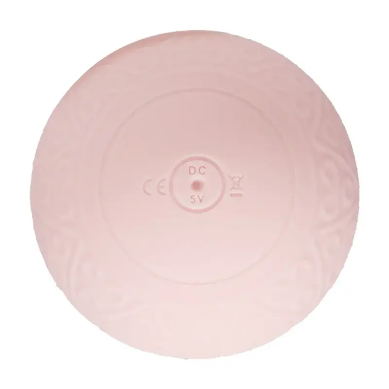 Vibrating and heating massager - pink